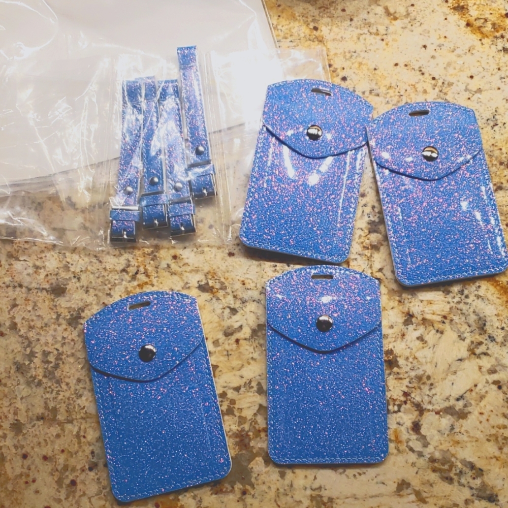 NWOT lot of 4 luggage tags